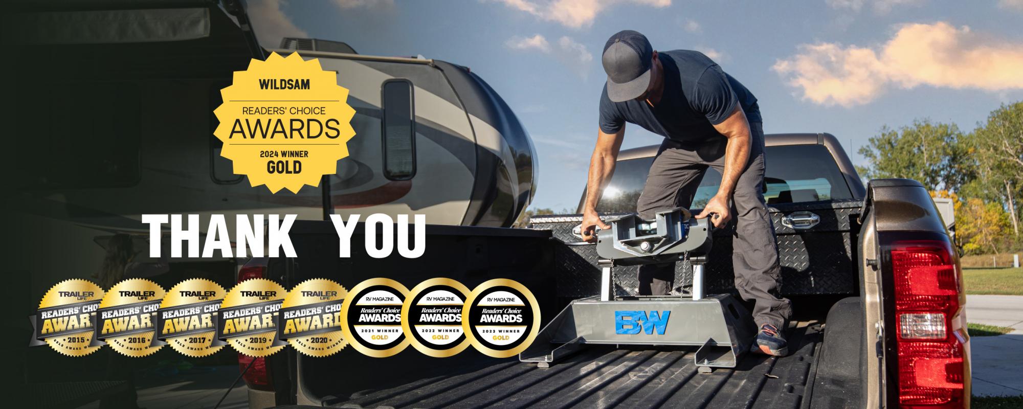 A photo of a man interacting with a B&W Companion Fifth Wheel Hitch, overlayed by a graphic reading "Thank You" alongside gold medal awards from Trailer Life, RV, and Wildsam magazine.